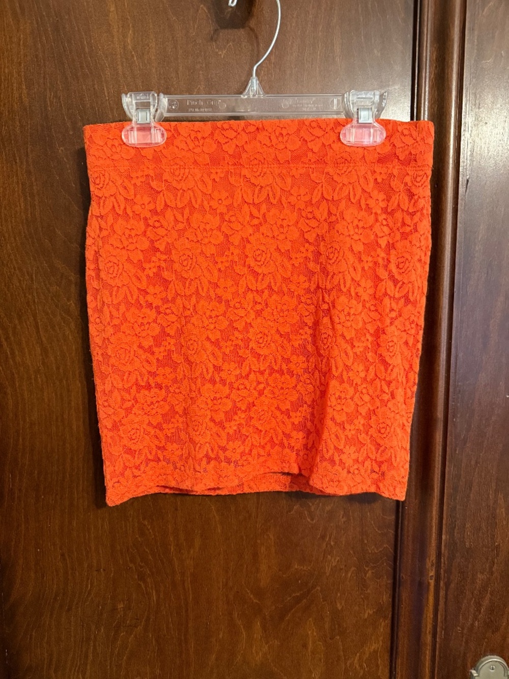 Orange lace mini skirt